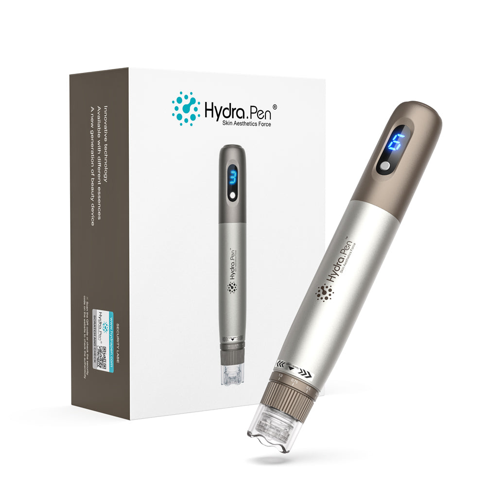 Sølv- og bronzefarvet Hydra Pen H3 ved siden af den originale produktæske